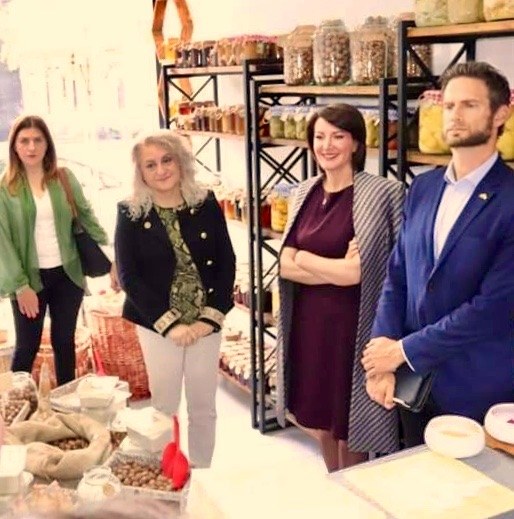 With the first female President of Kosovo, visiting a local artisan cooperative